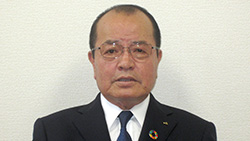 根岸信一郎組合長