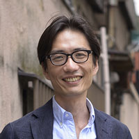 むすびえの湯浅理事長