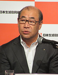 記者会見する浅田会長