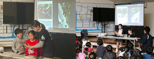 収穫ロボットでゲームのようなハラハラ・ドキドキを体験する児童ら