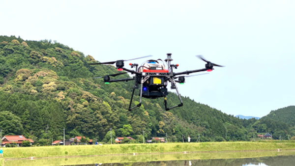 製粒剤散布機による「大粒ダイヤ」の鉄コーティング直播　日本初の実演　ニックス