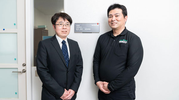 九州大学田代幸寛准教授（左）と株式会社welzo取締役/SSP Project Leaderの後藤基文氏